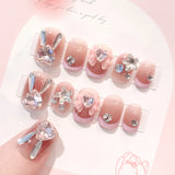 Yeknu  Glitter Fairy Rhinestone False nail Tips for Bride lady Wearable Sweet Crystal Design Press on Nails Mid Length Fake Nail Patch
