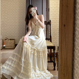 Yeknu  New Summer French Sleeveless Suspender Dress Seaside Vacation Long Beach Dress Ruffle Cake Backless Sexy Maxi Dresses