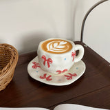 Yeknu 1Set Asymmetrical Hand-Kneaded Bow Coffee Cup and Saucer, Niche Design Bow Coffee Cup and Saucer, Exquisite High-End Coffee Cup, Suitable for Home Decoration, Breakfast Milk Bread, Afternoon Tea Coffee Cake, Party Cup a
