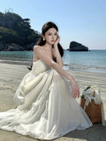 Yeknu  French Elegant White Suspender Dress Women Summer Sleeveless Seaside Holiday Style Beach Long Dress