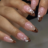 Yeknu  Short Glossy Oval Press-On Nails with French Glitter Tips Spring Flower Designs False Nail Tips for Women&Girls Manicure Look