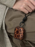 Yeknu  Amber Leopard Print Airpods 4 Generation Headphone Case With Niche Leather Strap Suitable For Iphone 3 Pro Protection