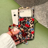 Yeknu  Niche high-end leopard print blue bow cherry chain suitable for 17promax Apple 16 mobile phone case all-inclusive edge