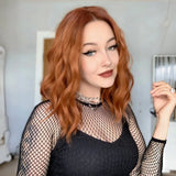 Yeknu  Short Wavy Curly Bob Wigs for Women Ginger Orange Shoulder Length Middle Part Copper Natural Wave Heat Resistant Cosplay Party