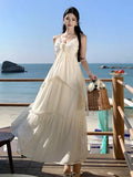 Yeknu  French Elegant White Suspender Dress Women Summer Sleeveless Seaside Holiday Style Beach Long Dress