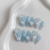 Yeknu  10 pieces of handmade coffin shaped nails, beautiful fake nails, light blue gradient nail art, three-dimensional white flowers,