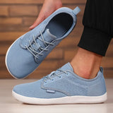 Yeknu  Minimalist Shoes for Men Breathable Comfortable Fashionable Wide Toe Barefoot Shoes Lightweight Adjustable Slip on Walking Shoes