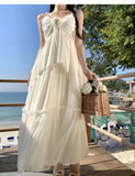 Yeknu  French Elegant White Suspender Dress Women Summer Sleeveless Seaside Holiday Style Beach Long Dress