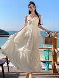 Yeknu  French Elegant White Suspender Dress Women Summer Sleeveless Seaside Holiday Style Beach Long Dress