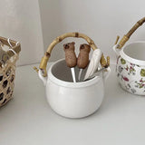 Yeknu  Ceramic Pot Basket with Hand Woven Rattan Pole Handle Bowl Basket Organizer Box Makeup Brushes Pens Remotes Coffee Table Storage