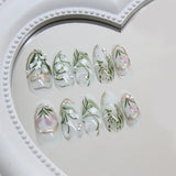 Yeknu  24Pcs Press On Nails Lily of the Valley&Tulip Floral Almond Fake Nails with Pearl&Rhinestone Accents Reusable False Nails