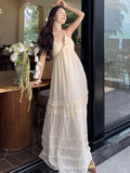 Yeknu  New Summer French Sleeveless Suspender Dress Seaside Vacation Long Beach Dress Ruffle Cake Backless Sexy Maxi Dresses