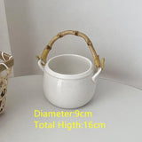 Yeknu  Ceramic Pot Basket with Hand Woven Rattan Pole Handle Bowl Basket Organizer Box Makeup Brushes Pens Remotes Coffee Table Storage