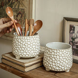 Yeknu  Pinecone-shaped three-legged ceramic storage jar and kitchen tool holder, a distinctive and personalized decorative item
