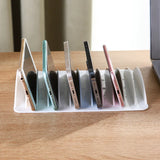 Yeknu  Multi-slot tablet and phone charging storage box, placement stand, plastic holder, portable with multiple card slots.