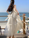 Yeknu  French Elegant White Suspender Dress Women Summer Sleeveless Seaside Holiday Style Beach Long Dress