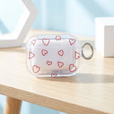 Yeknu  Minimalist red hollow heart-shaped transparent TPU shell shock-absorbing headphone cover with metal keychain