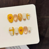 Yeknu  10Pcs Short Oval Press On Nails With Orange Flower Design False Nails For Women Spring Summer Wearable Detachable Fake Nail Tips