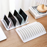 Yeknu  Multi-slot tablet and phone charging storage box, placement stand, plastic holder, portable with multiple card slots.