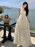 Yeknu  New Summer French Sleeveless Suspender Dress Seaside Vacation Long Beach Dress Ruffle Cake Backless Sexy Maxi Dresses