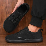 Yeknu  Minimalist Shoes for Men Breathable Comfortable Fashionable Wide Toe Barefoot Shoes Lightweight Adjustable Slip on Walking Shoes