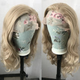 Yeknu  Long Curly Wavy Ash Blonde Synthetic Hair Free part Loose Body Wave Strawberry Blonde 13X4 Lace Front Wigs for Women Daily Party