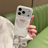 Yeknu  ins pink and white bow pearl pendant is suitable for Apple 17promax mobile phone case 16pro new iphon17 niche