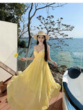 Yeknu  Yellow Backless Suspender Dress Female Summer Bohemian Seaside Holiday Beach Long Dress
