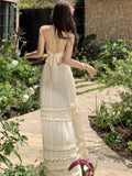 Yeknu  New Summer French Sleeveless Suspender Dress Seaside Vacation Long Beach Dress Ruffle Cake Backless Sexy Maxi Dresses