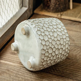 Yeknu  Pinecone-shaped three-legged ceramic storage jar and kitchen tool holder, a distinctive and personalized decorative item